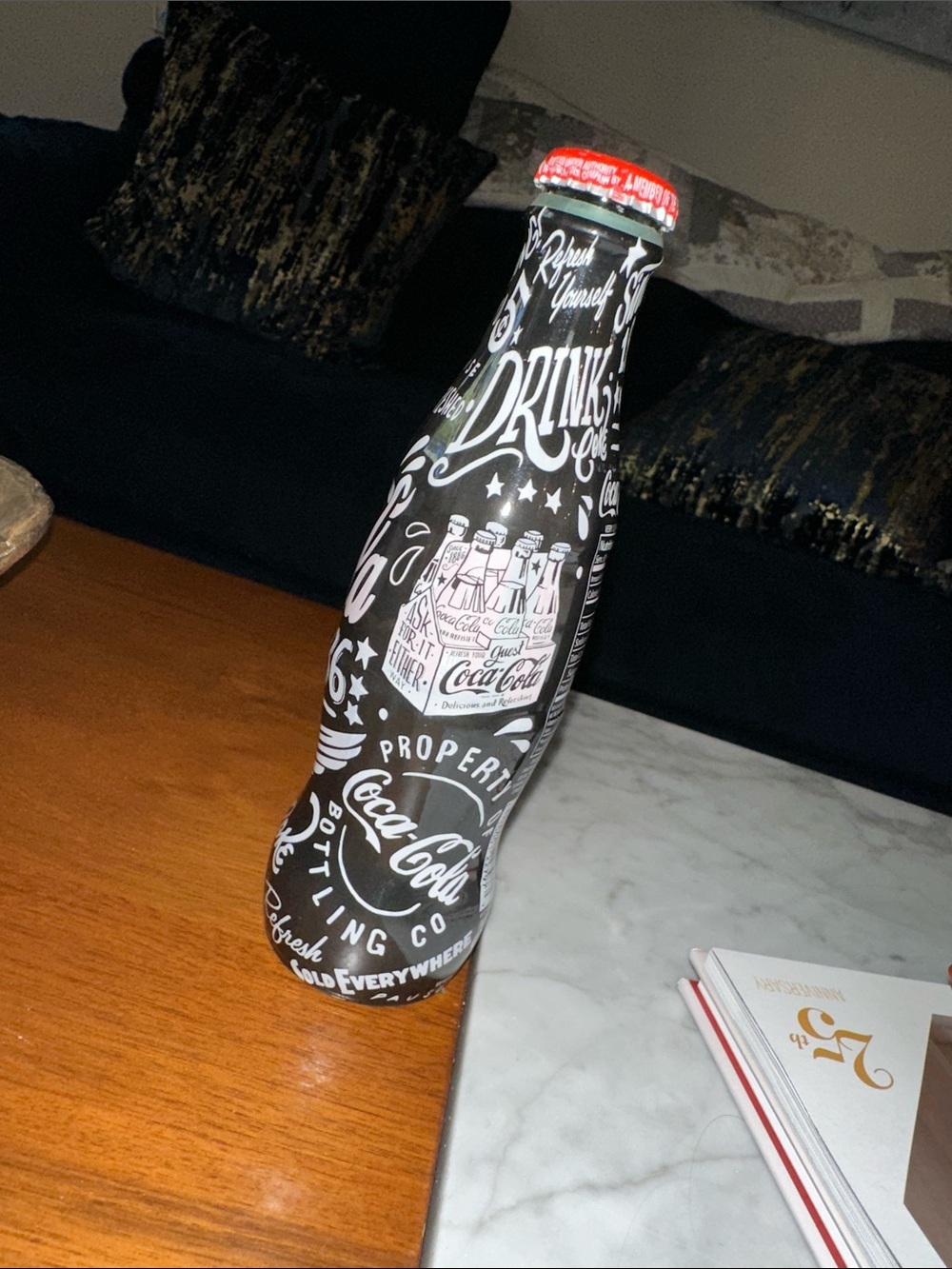 Coca Cola Black Bottle with White Graphic and Red Cap - Picture 3 of 6